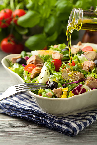 istock Tuna salad with lettuce, eggs and tomatoes. 607995108