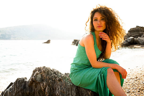 istock girl in the beach 607995340
