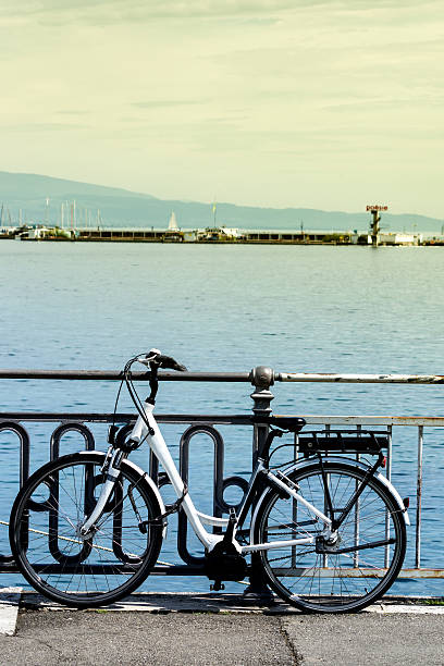 istock White Bicycle in beautiful Geneva Lake Switzerland 607995924