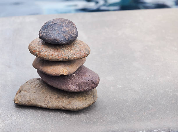istock Abstract image of round pebble stones 607997620