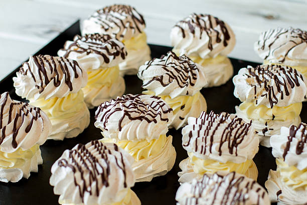 istock Rows of decorated meringues. 607997826
