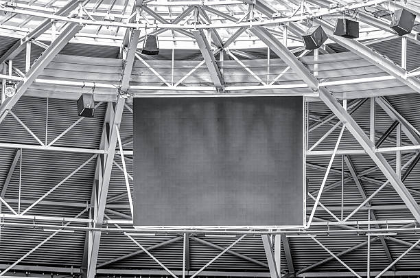 istock Modern stadium roof construction and LED display 607999136