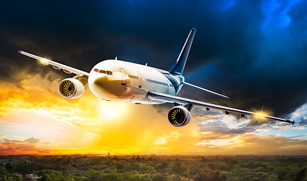 istock Airplane over rural scene 607999198