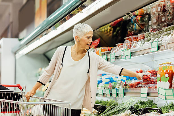 istock Mature Woman Groceries Shopping. 607999976