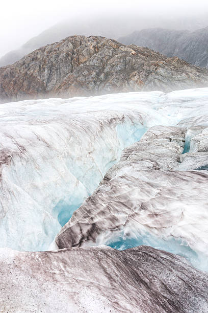 istock Beautiful eerie landscape on icy glacier 608001386