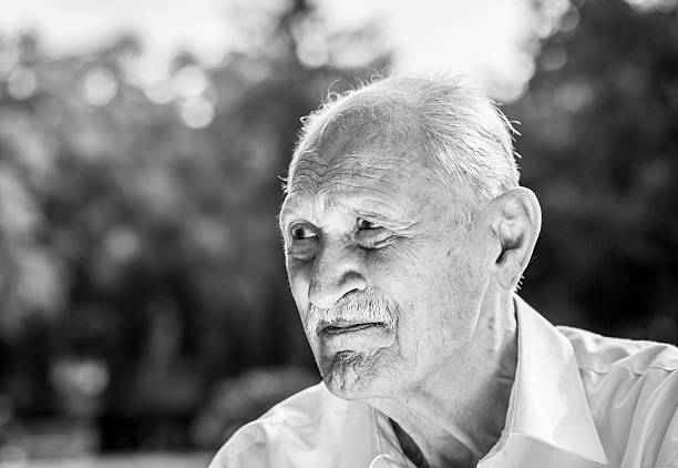 old man portrait in a park