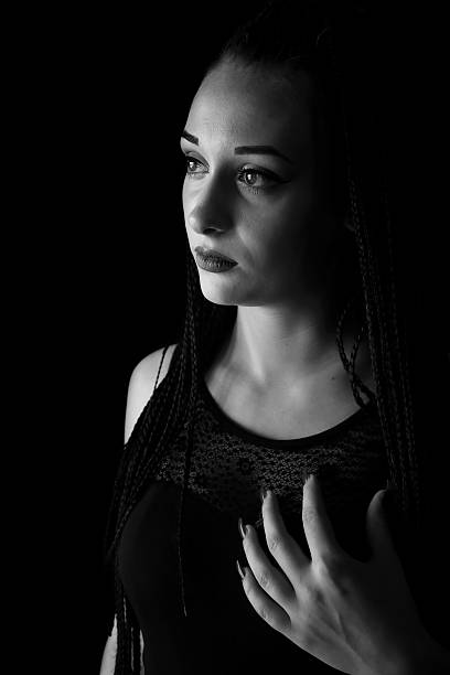 istock Studio portrait of young beautiful girl 608002078
