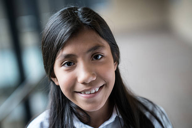 istock Happy girl at school 608002940