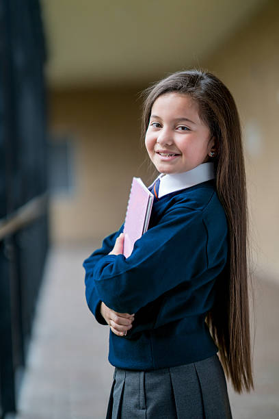 istock Happy girl at school 608003146