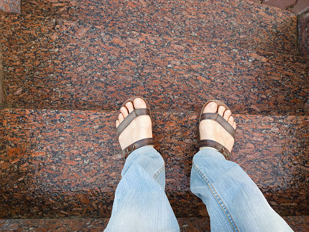 istock Feet on the stairs. 608004018