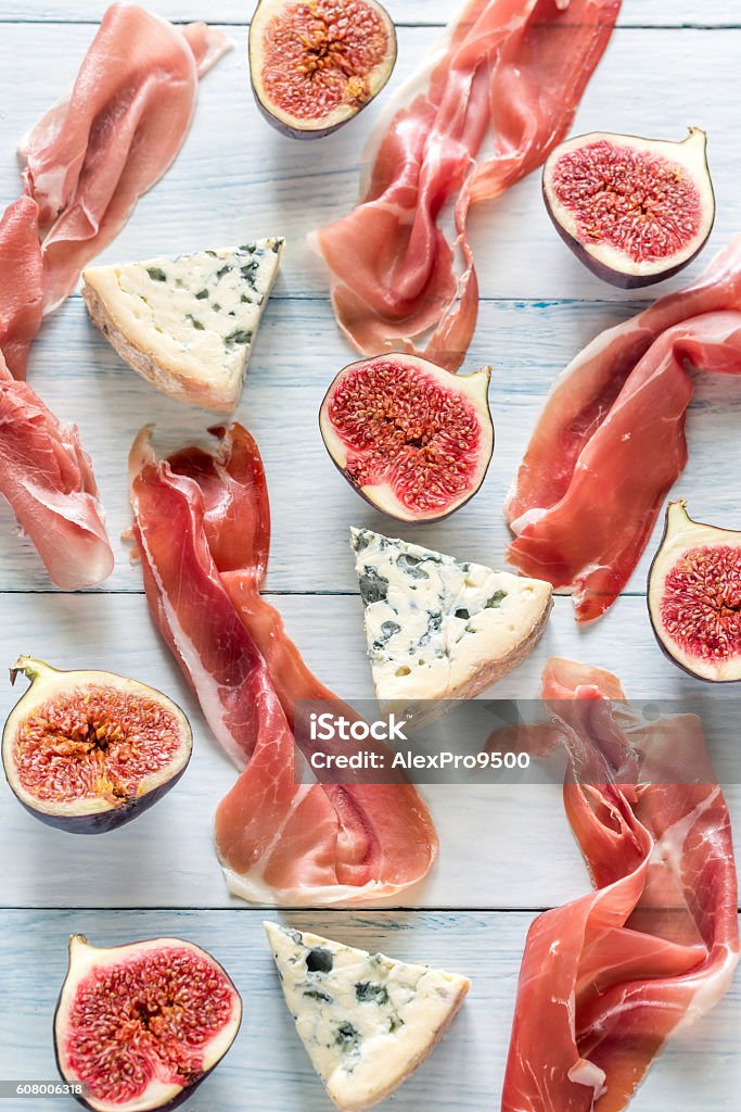 Slices of jamon with blue cheese and figs Appetizer Stock Photo