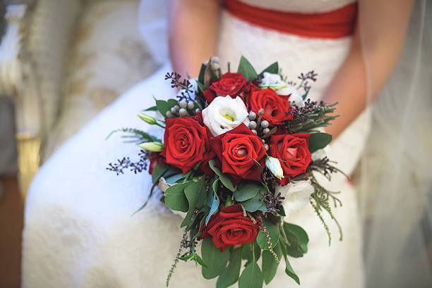 istock the bride holds a wedding bouquet 608006592