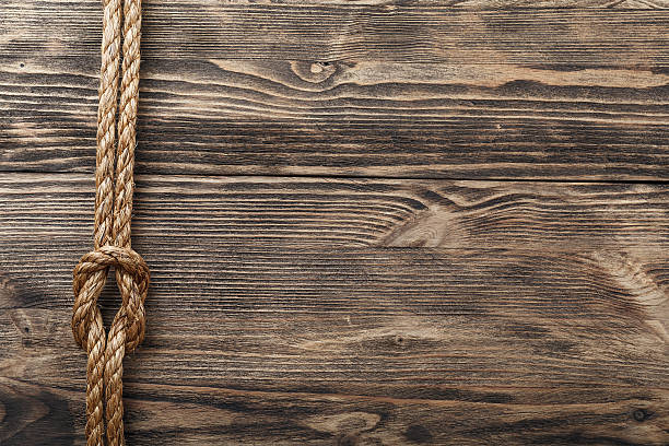 istock Picture with a rope on the old tree 608481736