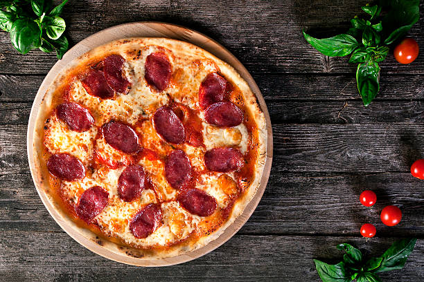 istock Pepperoni pizza with salami and cheese. 608482656