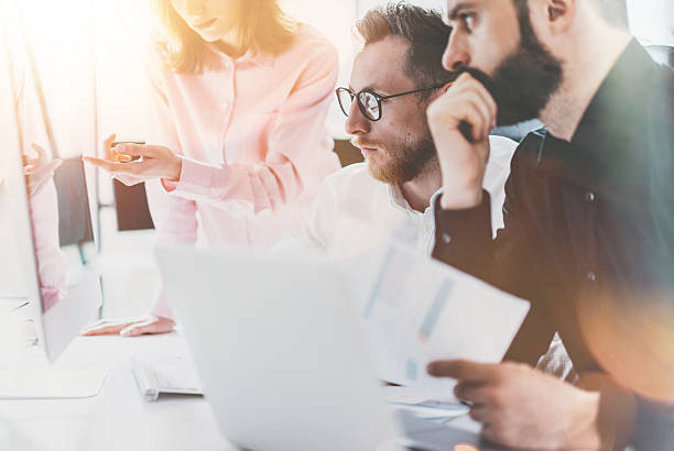 istock Coworkers Business Meeting Process Sunny Office.Closeup Teamwork Modern Concept 608492650