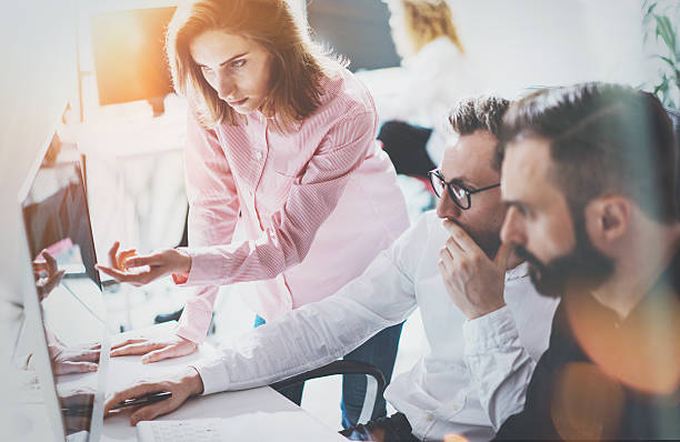 istock Coworkers Business Meeting Process Sunny Office.Closeup Teamwork Modern Concept 608494178