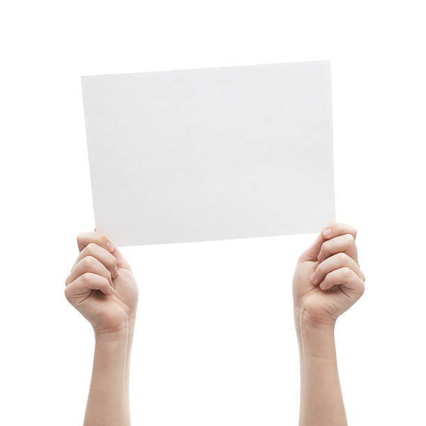 istock Two hands holding A4 sheet of paper 608494184