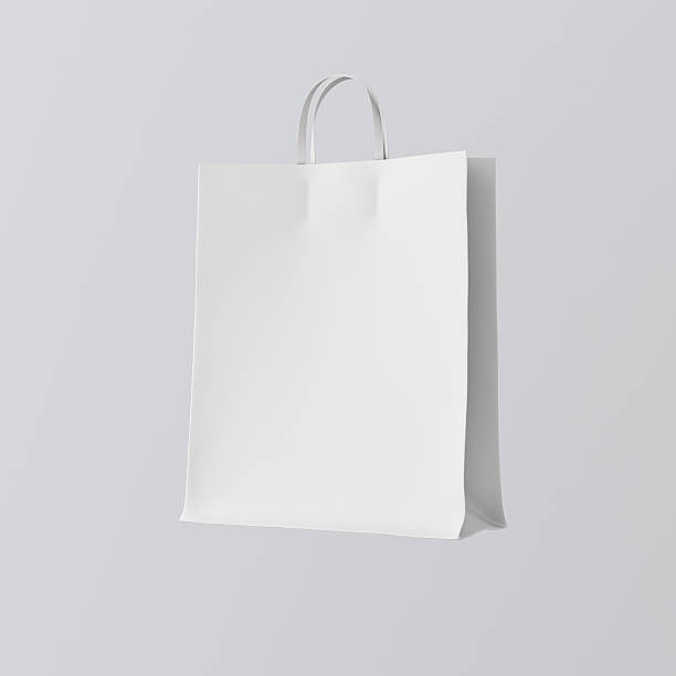 istock Closeup White Paper Bag Isolated Center Gray Empty Background.Mockup 608508586