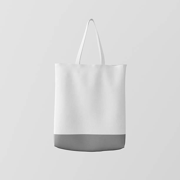 istock Closeup White Cotton Textile Bag Hanging Center Abstract Empty Background 608509406