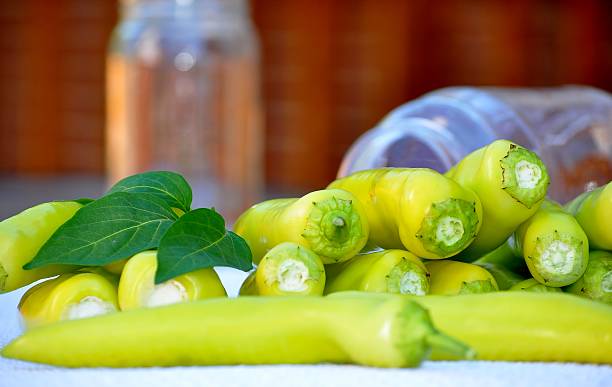 istock Preparation for pickling banana peppers. 608510172