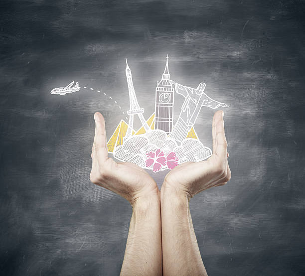 istock Hands holding traveling sketch 608512458