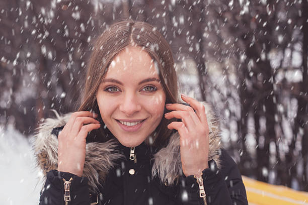 istock Woman and snow in winter 608512932