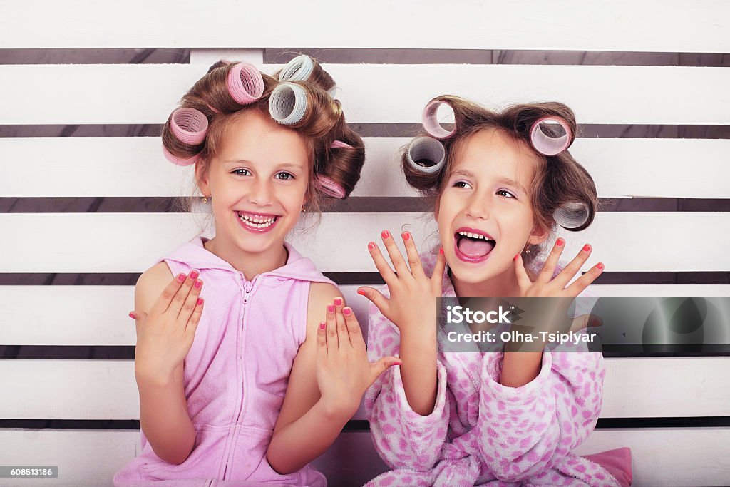 Children laugh and play in a beauty salon Child Stock Photo