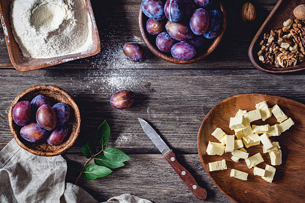 Pie cooking ingredients on rustic table