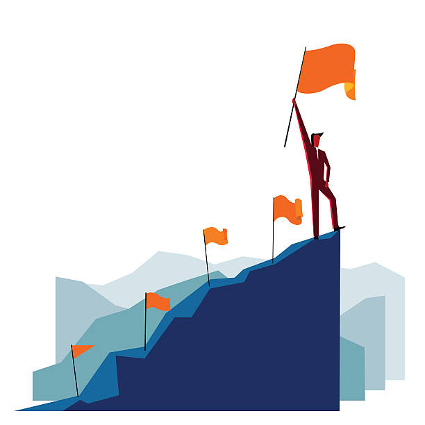 geschäftsmann mit flagge auf einem berggipfel - conquering adversity progress achievement challenge stock-grafiken, -clipart, -cartoons und -symbole