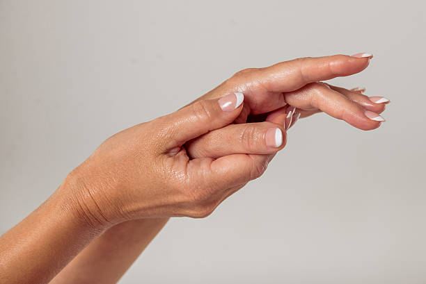 istock Hands of middle aged woman 608515130