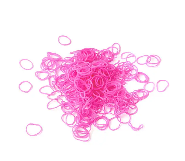Photo of Pile of pink rubber loom bands