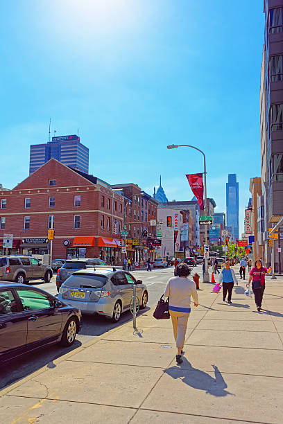 Philadelphia, United States - May 5, 2015: Chinatown in Philadelphia, in Pennsylvania, the USA. Tourists crossing in the street