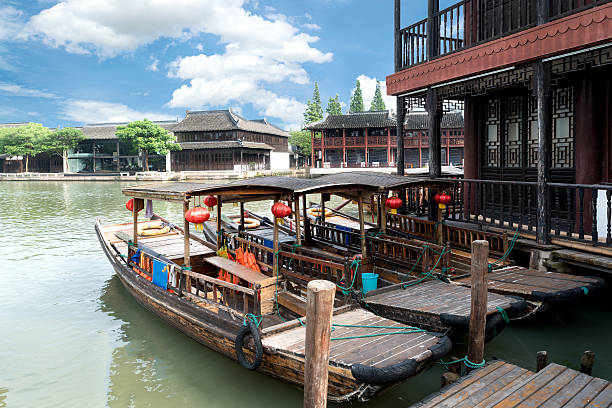 China traditional tourist boats on canals of Shanghai Zhujiajiao China traditional tourist boats on canals of Shanghai Zhujiajiao Water Town in Shanghai, China Zhujiajiao stock pictures, royalty-free photos & images