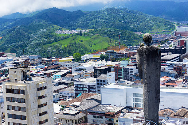 Statue on the basilica overlooking the city of Manizales, Colombia