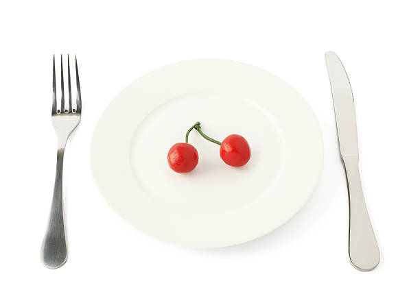 Cherry fruit in a plate isolated