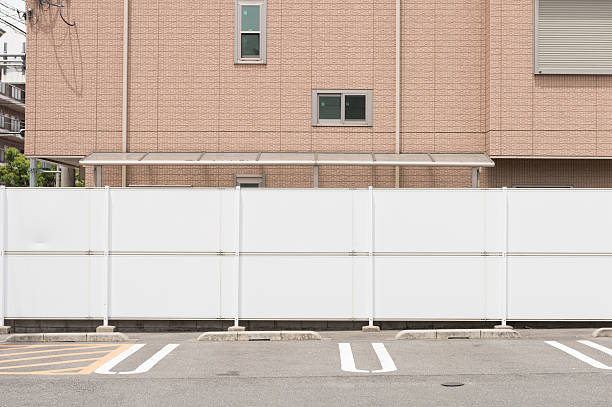 istock Large blank billboard on a street wall 608519110