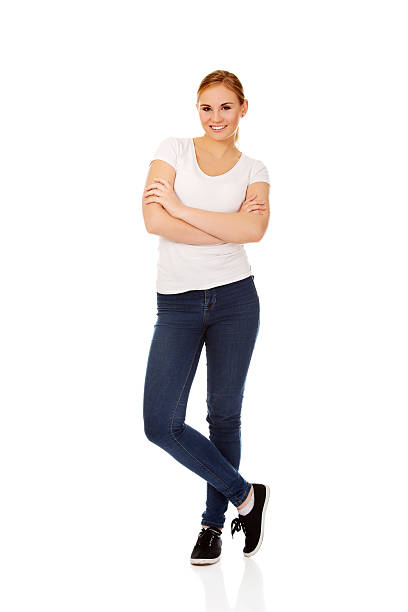 istock Happy young woman wiyh folded arms 608522920