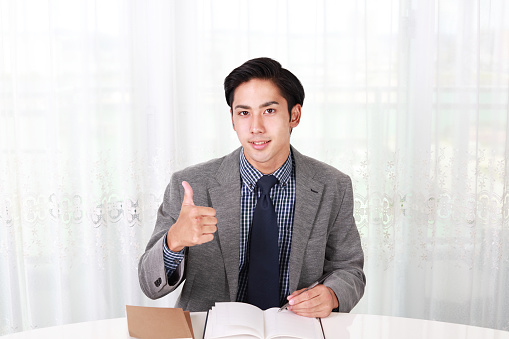 Businessman with ok hand sign
