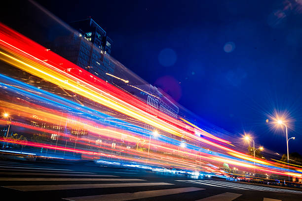 istock blurred traffic in downtown district,hong kong,china 608525976