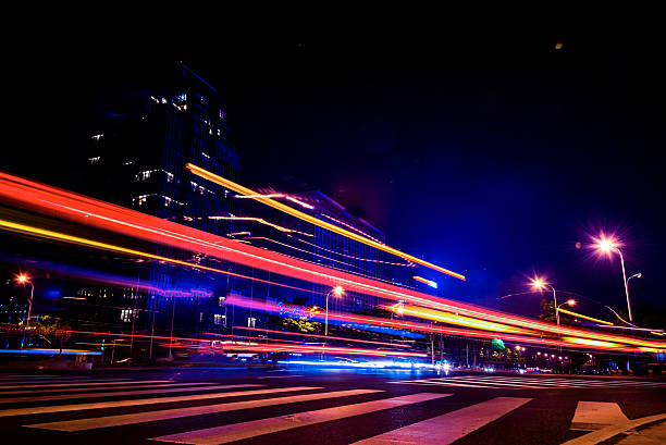 istock blurred traffic in downtown district,hong kong,china 608526214