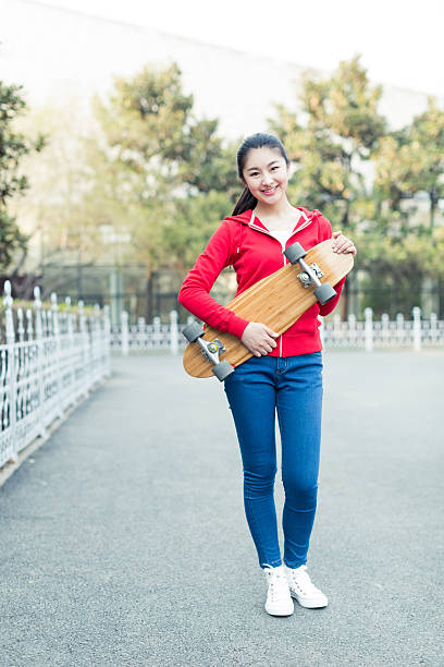 istock girl and her skateboard 608535418