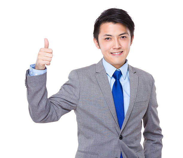 istock Businessman giving thumbs up 608539046