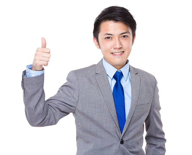 istock Businessman giving thumbs up 608539060