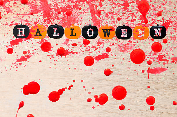 Halloween background , black and orange pumpkins on wooden background