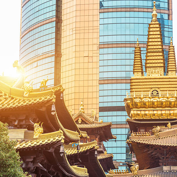 istock Low Angle View Of Historic Temples Against modern building 608539920