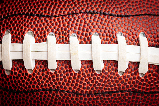 istock detail of football thread 608540366