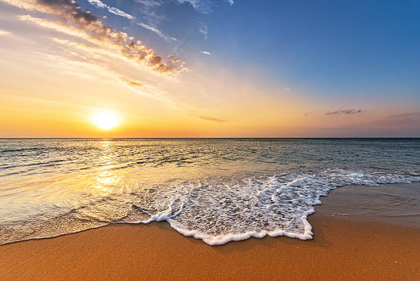istock Aruba sunset over moving sea. 608542042