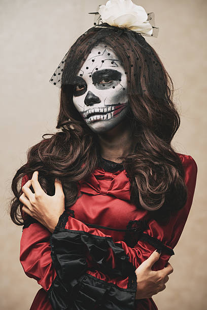 istock Sugar skull girl 608543356
