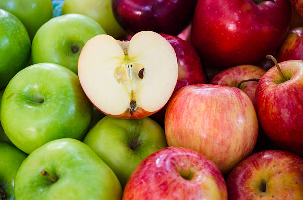 istock group of green and red apples 608552244