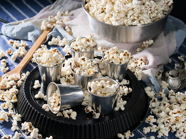 istock Popcorn in alluminium glasses for a party 608567712
